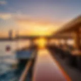 A scenic view of a boat restaurant in Dubai at sunset, highlighting its elegant design and surroundings.