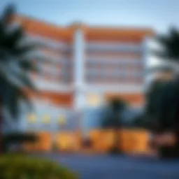 Exterior view of a luxurious hotel in Qusais, showcasing modern architecture