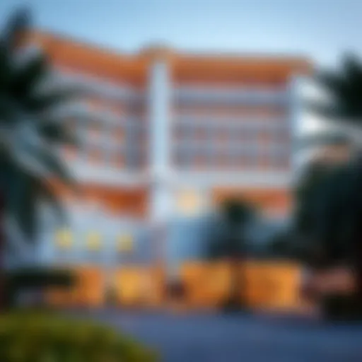 Exterior view of a luxurious hotel in Qusais, showcasing modern architecture