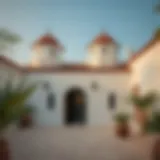 Traditional Emirati house showcasing wind towers and courtyard design