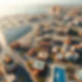 Aerial view of Al Qusais showcasing its diverse properties