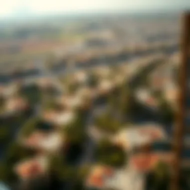 Aerial Perspective of Dubai's Thriving Neighborhoods Aerial view of a bustling Dubai neighborhood with real estate opportunities
